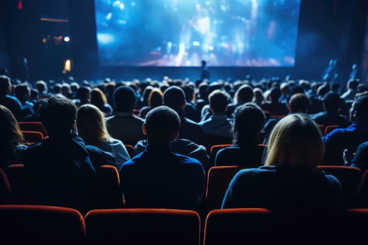 audience members sitting at a film festival, a fun camping event