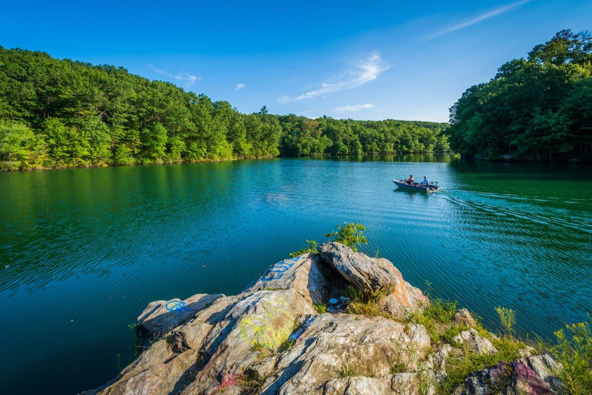 people on boat at PrettyBoy Reservoir near Freeland, MD, during spring break RV trip