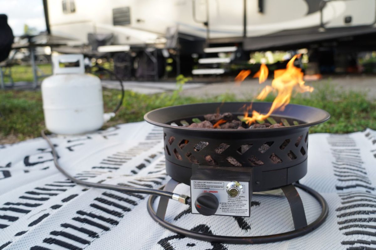 portable propane fire pit outside RV in winter